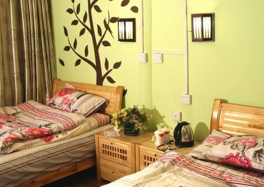 Tree'S Tale Hotel - Lijiang Lijiang (Yunnan) Bagian luar foto